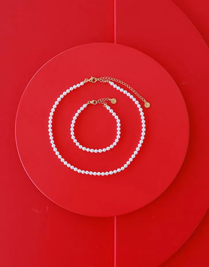 goldplated_silver_necklace_ballet_4_mm_4.webp Shop Majorica Gold-Plated Silver Necklace Ballet 4 Mm